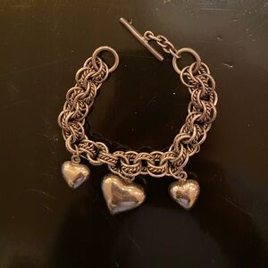 Silver bracelet with 3 hearts